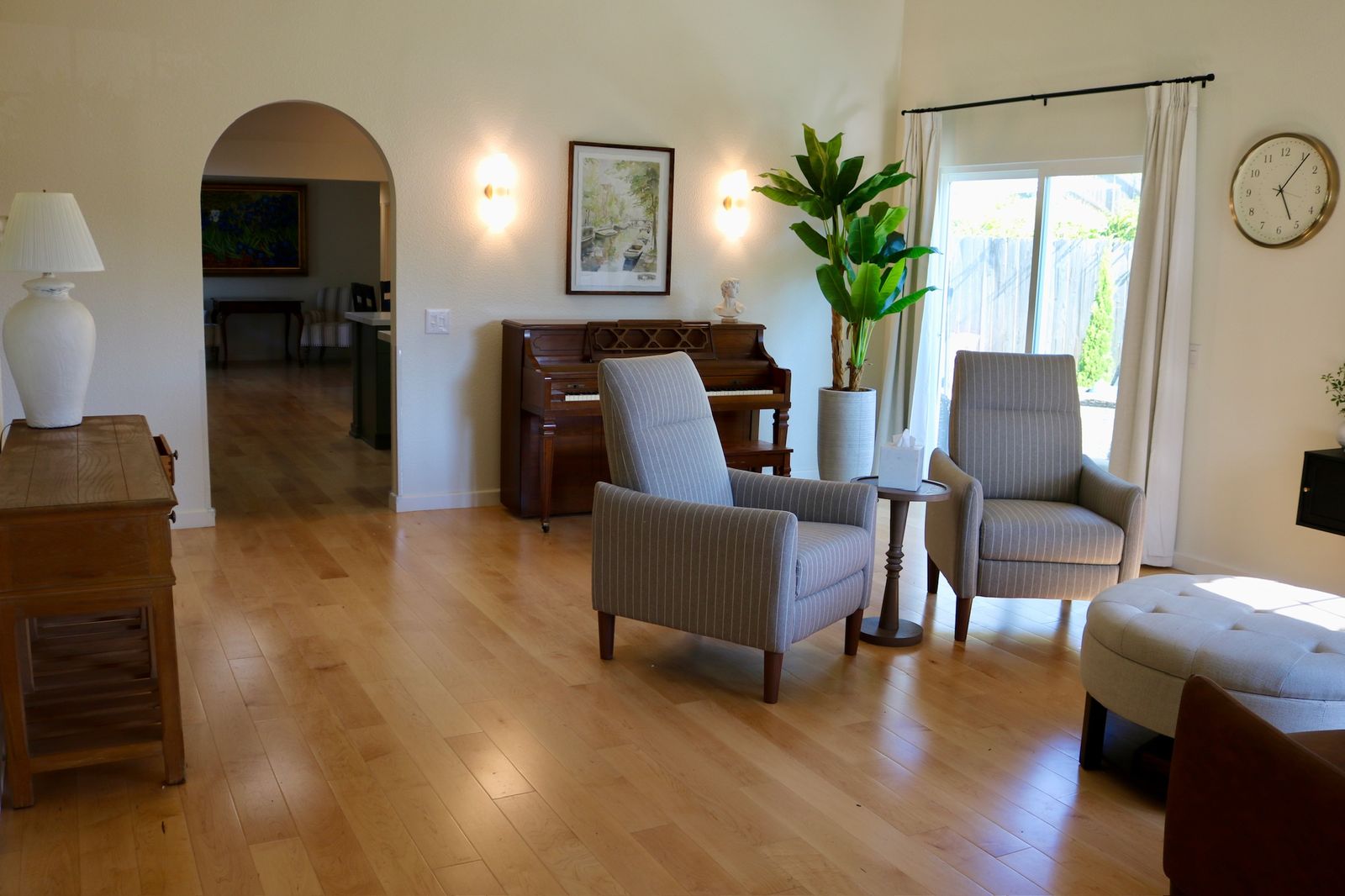 Second view of the sunlit living room at Olive Tree Elderly Homes