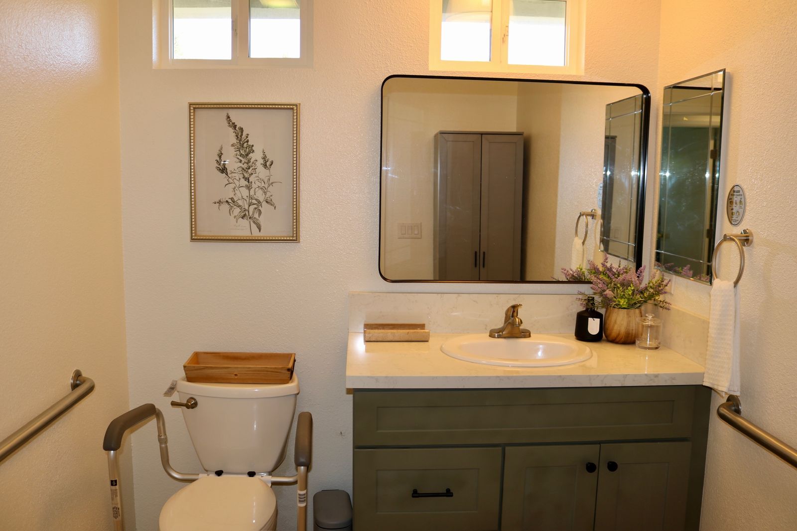 Shared half bath with clean, accessible fixtures